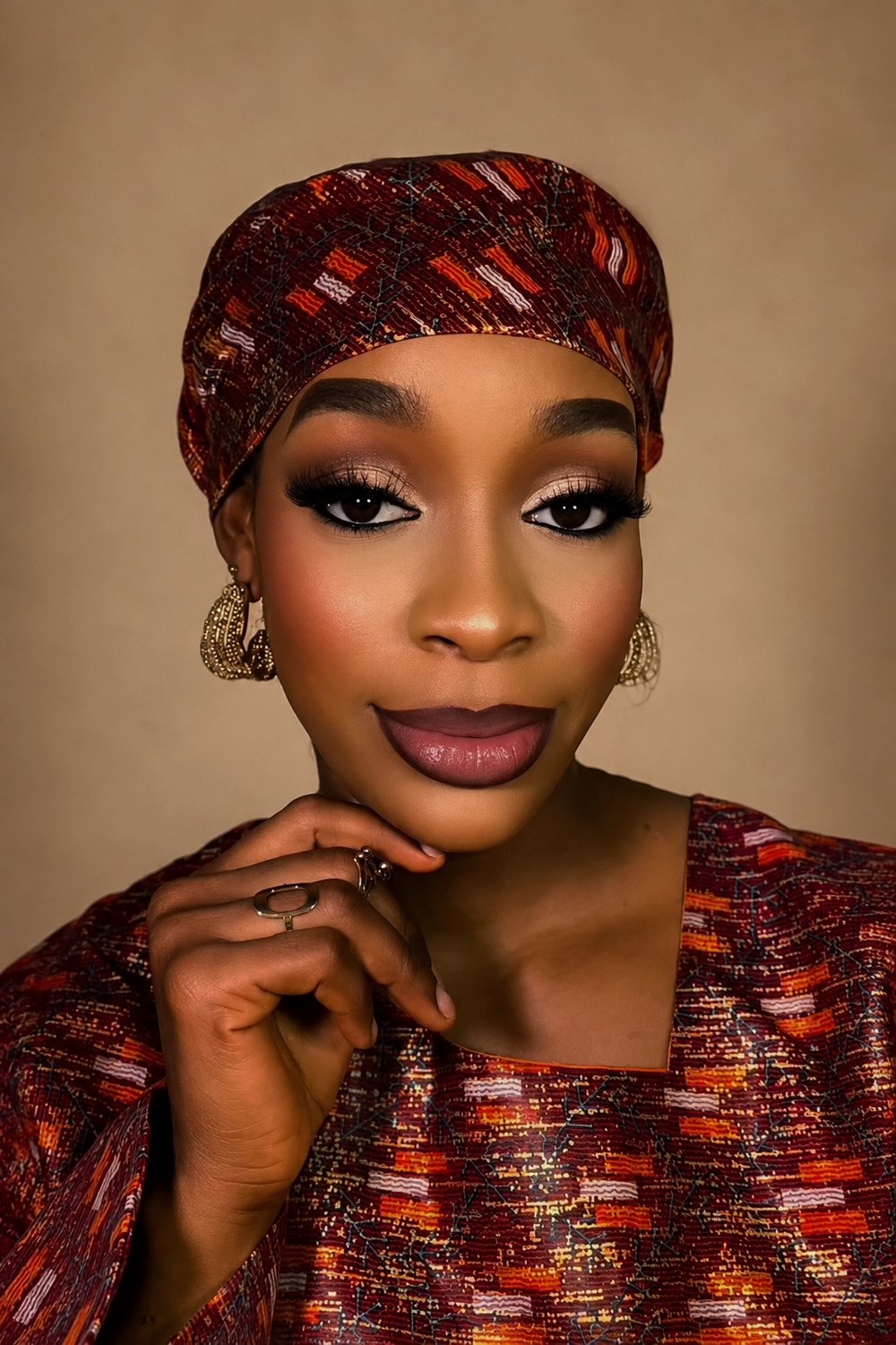 Glam makeup by glamby_meemah, bold glam with ankara headwrap and gold beaded earrings